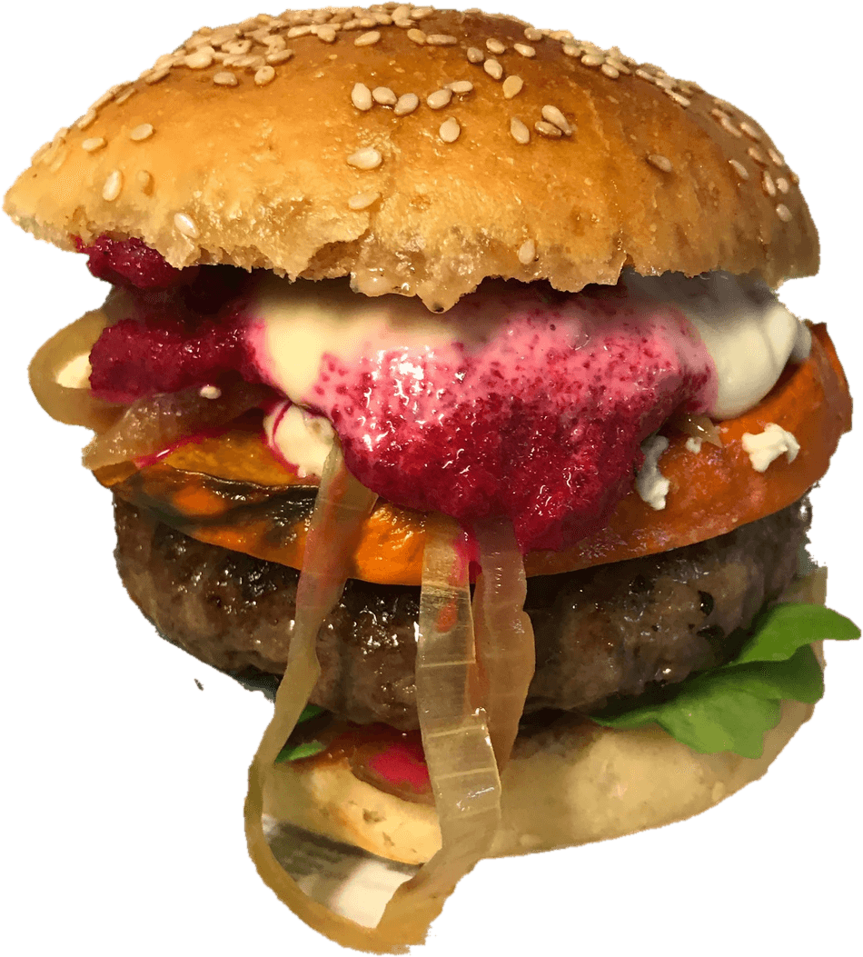 Burger im Sesam-Bun mit Patty, pinkfarbener Creme, heller Sauce, einer orangefarbenen Gemüsescheibe, glasigen Zwiebeln und Rucola